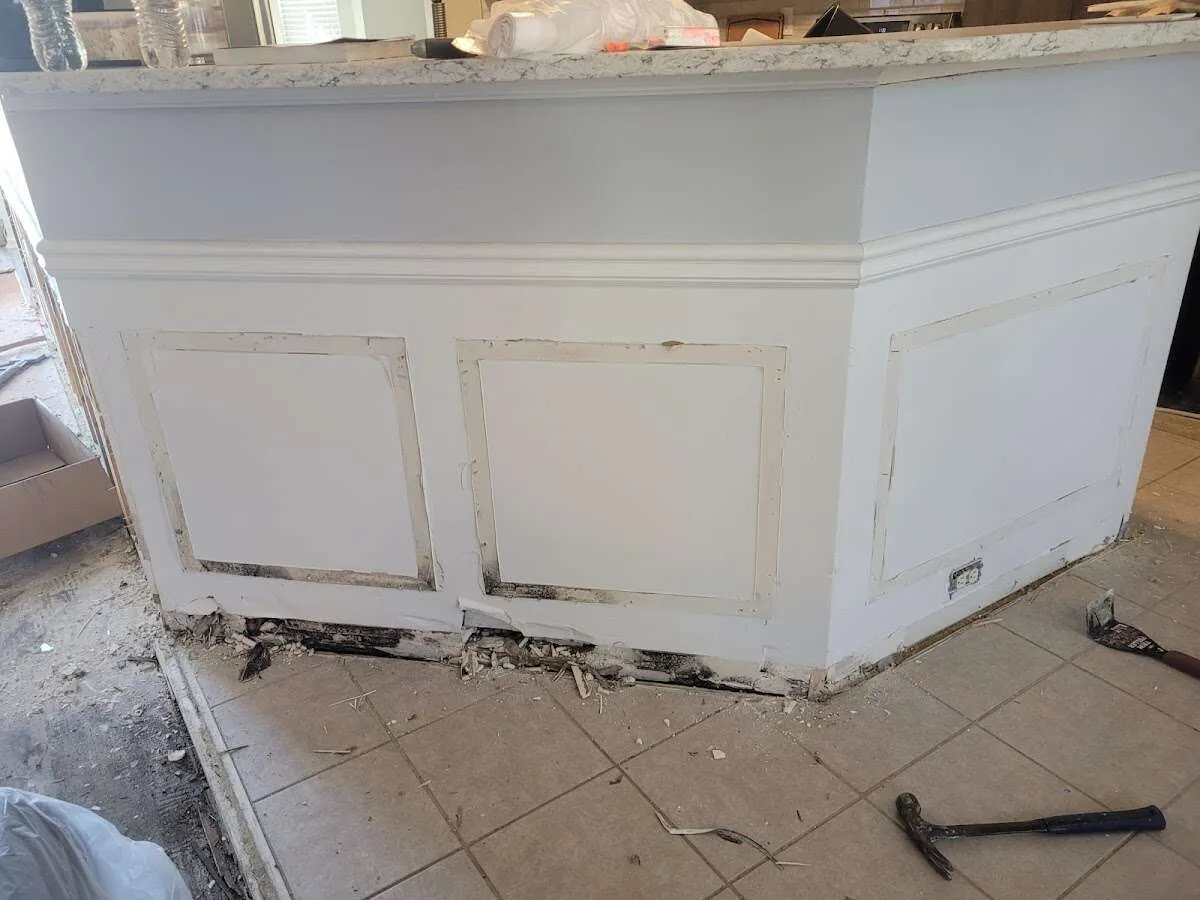 Water damage and mold on kitchen during Storm Damage Restoration in Catoosa